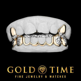 Custom 10 piece two-tone gold grillz with trillion cut top canines and open window bottom row on dental molds