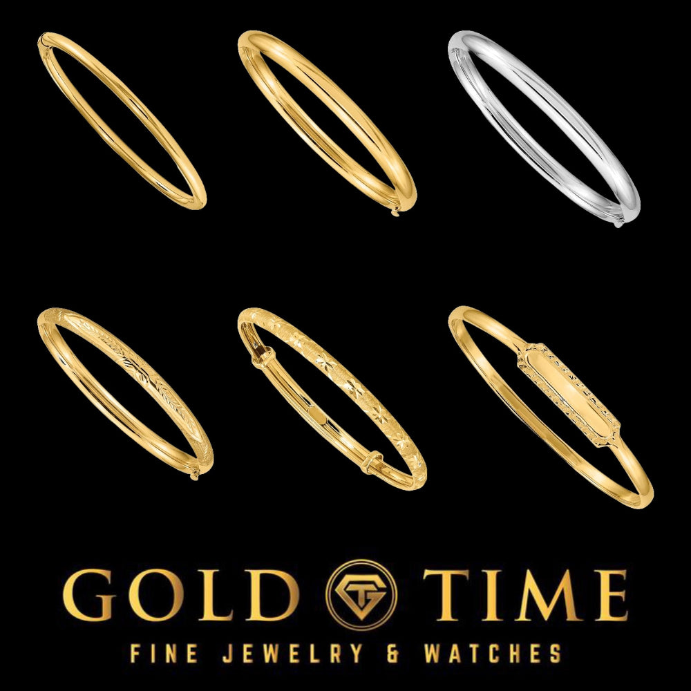 Six 14K gold baby bangles in slip-on, hinged, diamond-cut, and ID styles on a black background