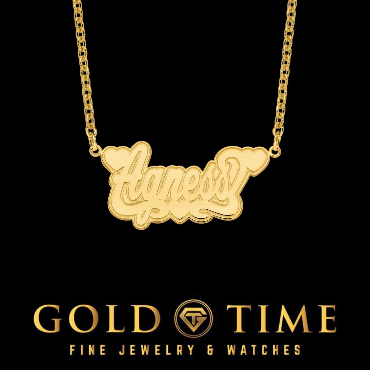 Personalized script name necklace with heart accents in yellow gold on a cable chain