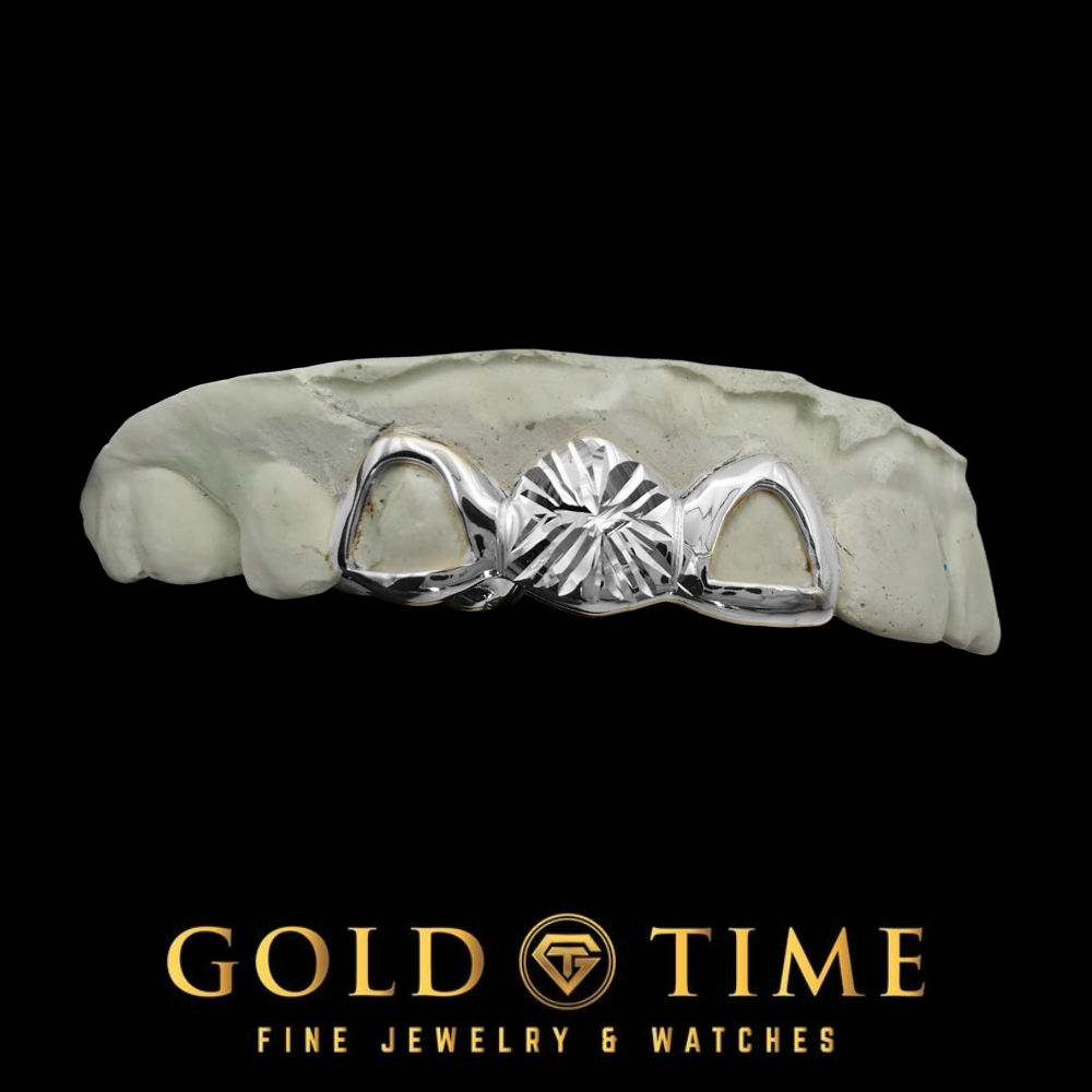 A silver tooth grill on a dental mold against a black background, with the Gold Time brand logo at the bottom.