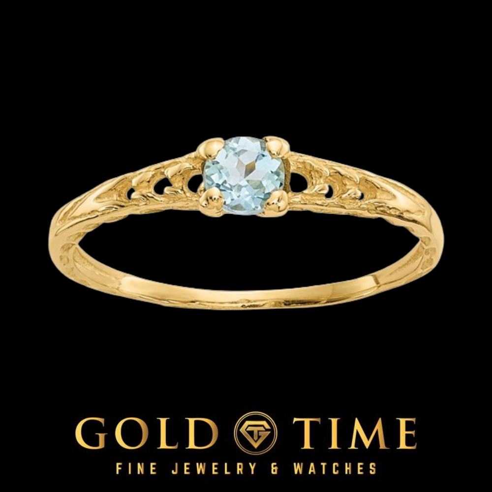 14k gold children's ring with a round pale blue aquamarine in a four prong setting