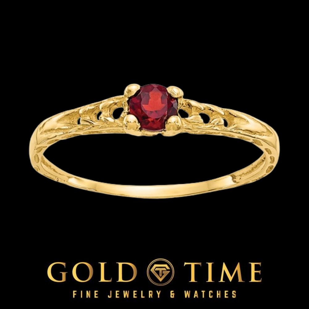 14k gold children's ring with a round deep red garnet in a four prong setting