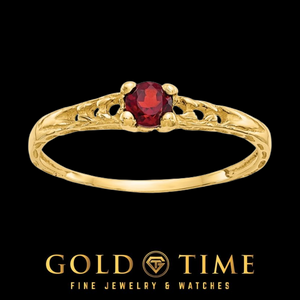14k gold children's ring with a round deep red garnet in a four prong setting