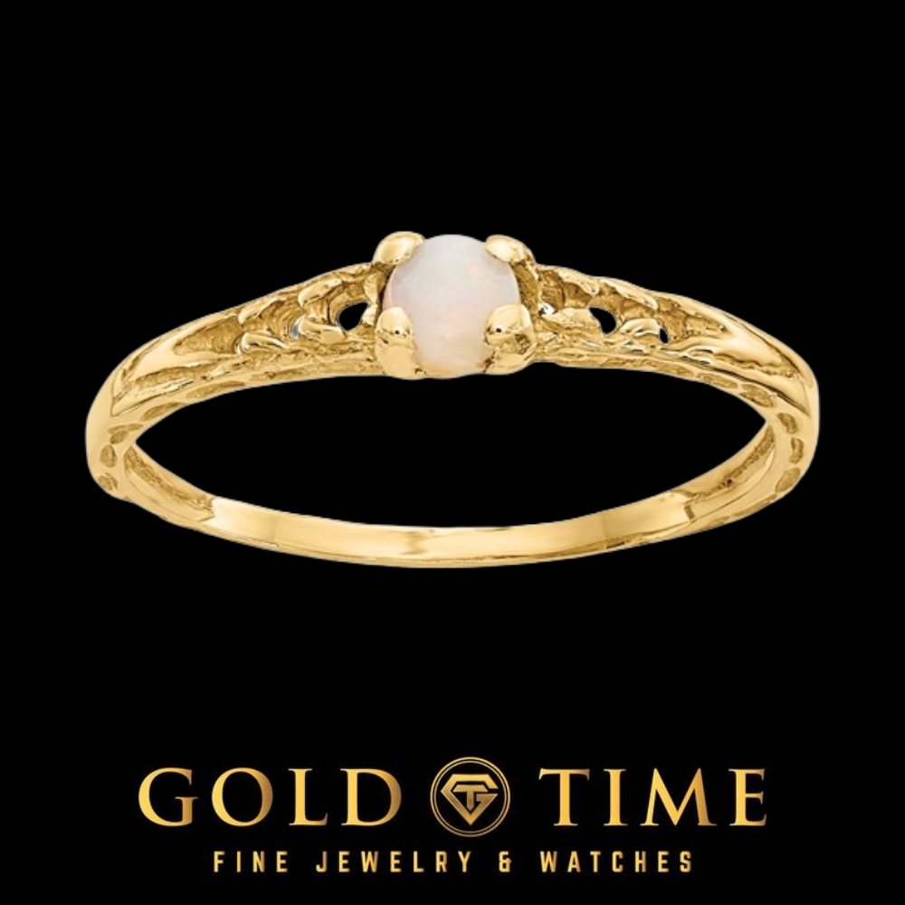 14k gold children's ring with a round white opal in a four prong setting