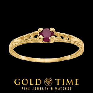 14k gold children's ring with a round red ruby in a four prong setting