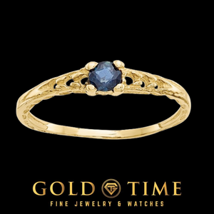 14k gold children's ring with a round blue sapphire in a four prong setting