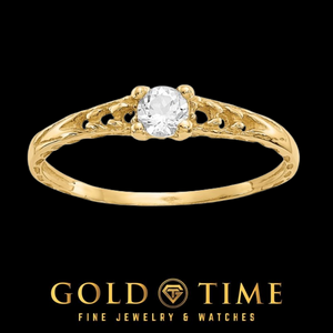 14k gold children's ring with a round clear white topaz in a four prong setting