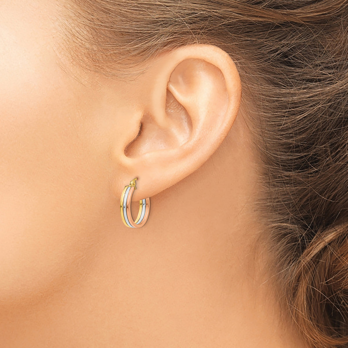 14K Tri-Color Gold Triple Band Hoop Earrings, worn on the ear