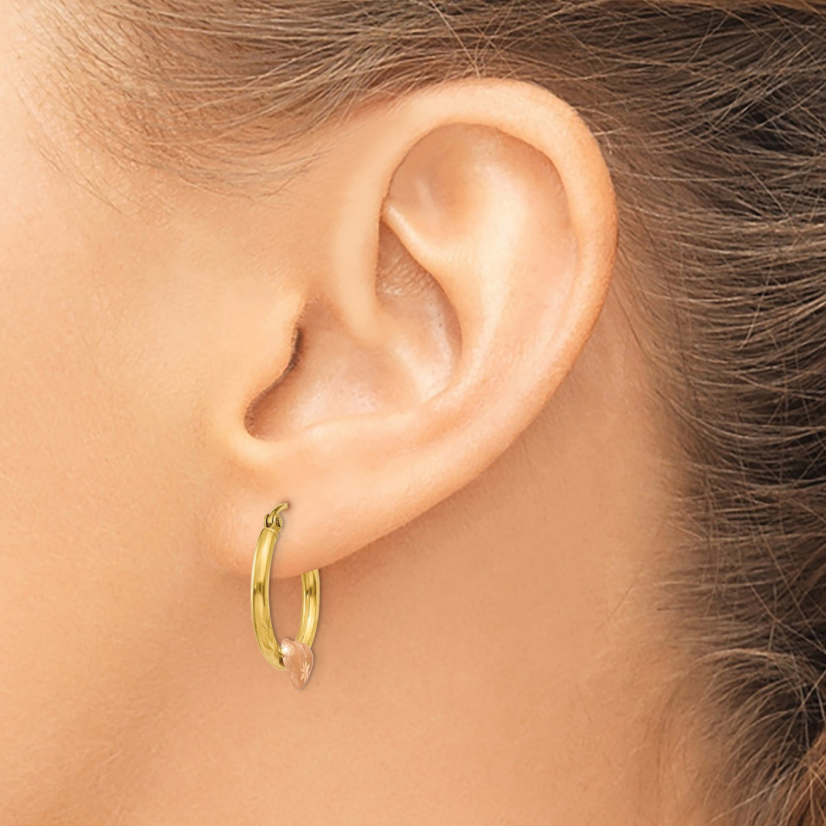14K Yellow and Rose Gold Heart Hoop Earrings, 20mm, worn on the ear