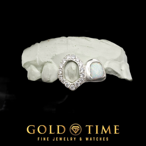 White metal double cap grillz with a synthetic opal cap and an iced open face fang on a dental mold, Gold Time