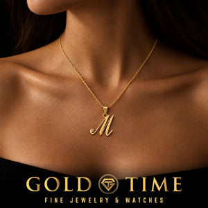 14K gold script initial necklace with a diamond worn just below the collarbone, Gold Time