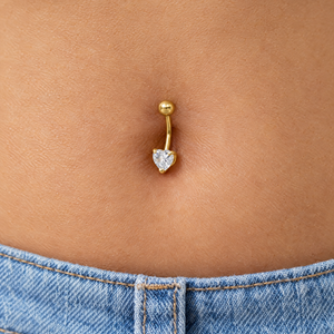 14K yellow gold heart stone belly button ring worn in a navel piercing, lifestyle photo, Gold Time