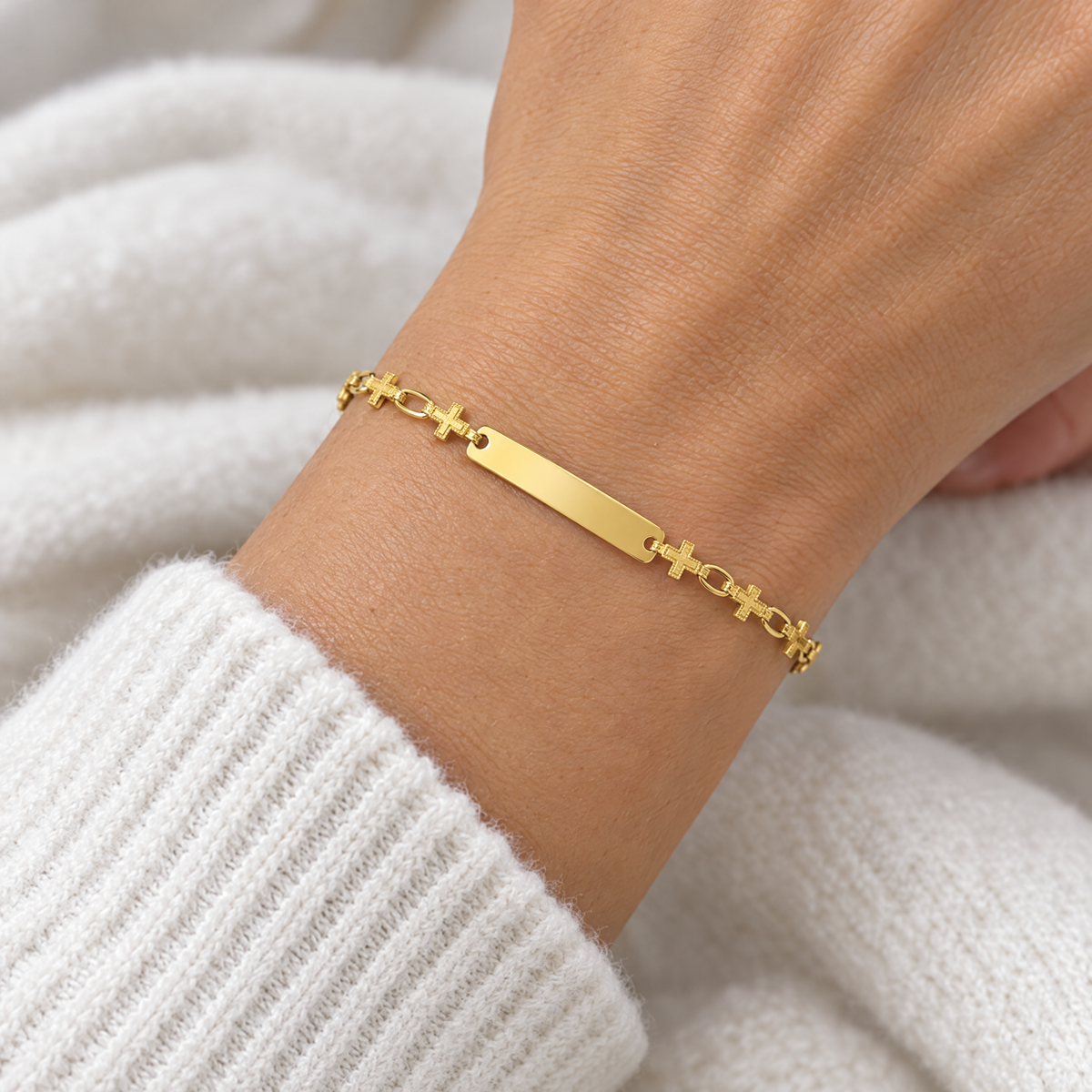 Gold plated cross link ID bracelet with a blank engravable plate, worn on a woman's wrist, lifestyle photo, Gold Time