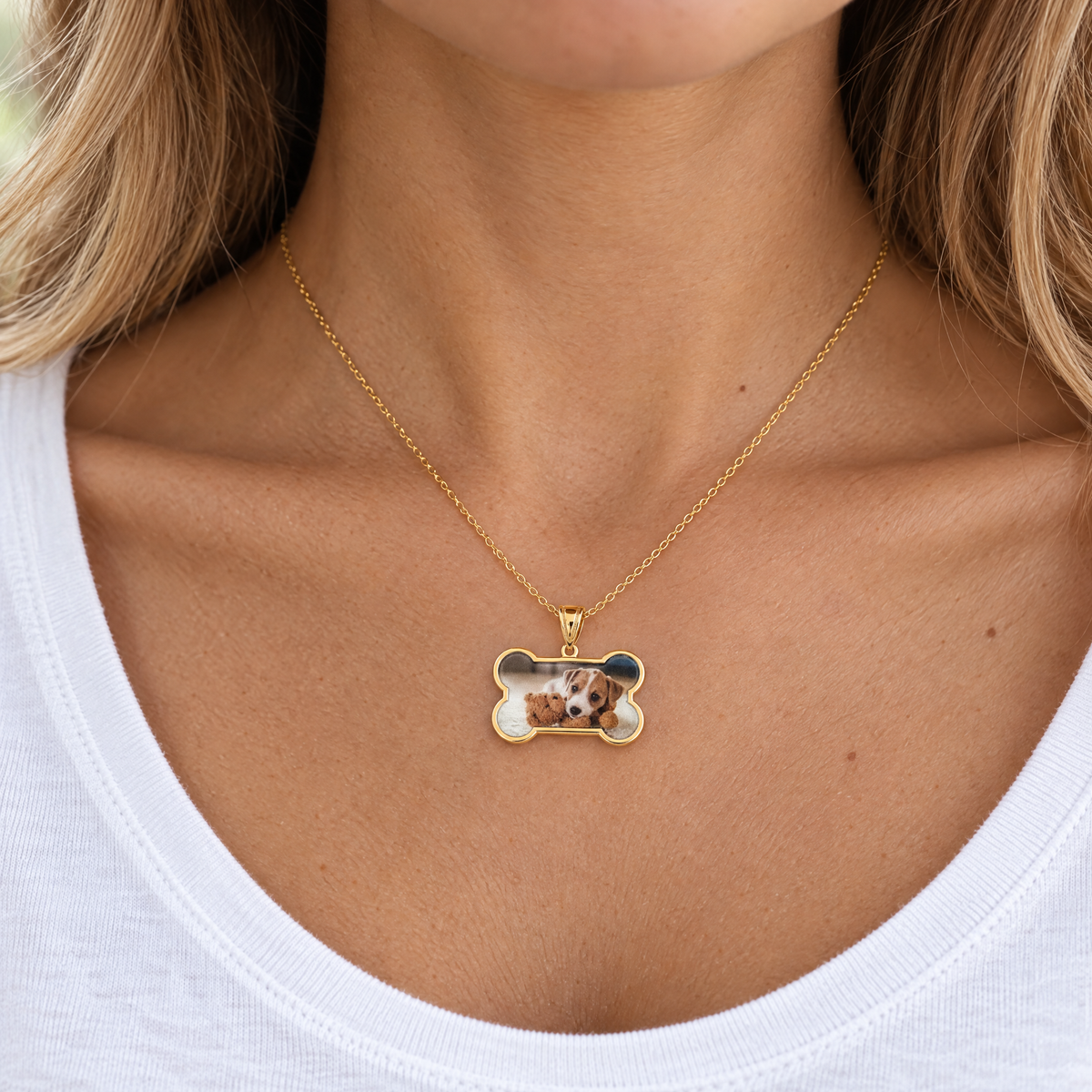 Gold plated dog bone photo pendant with a puppy photo, worn by a woman, lifestyle photo, Gold Time