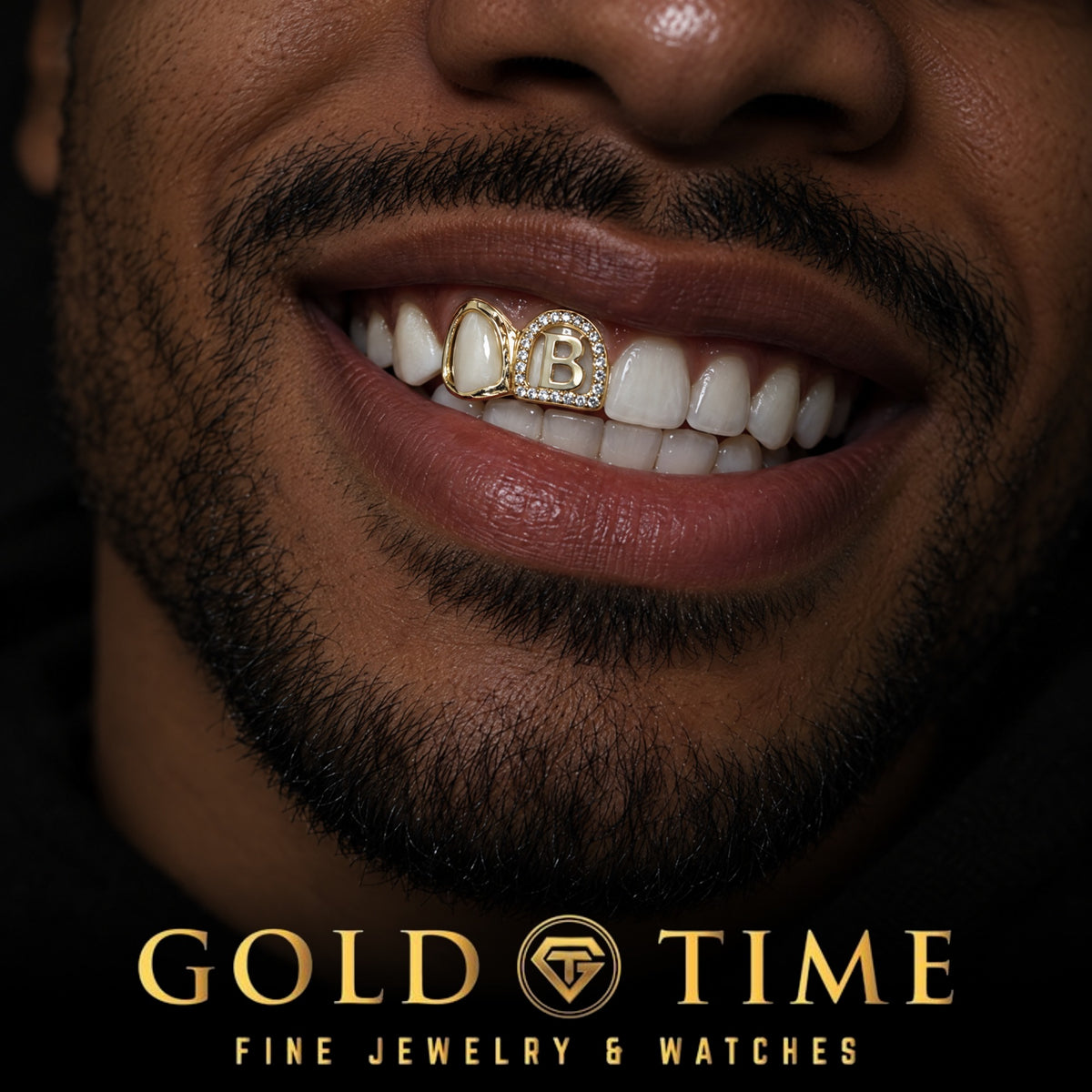 Man smiling in a gold double cap grill with an open face canine and a moissanite border initial B, Gold Time
