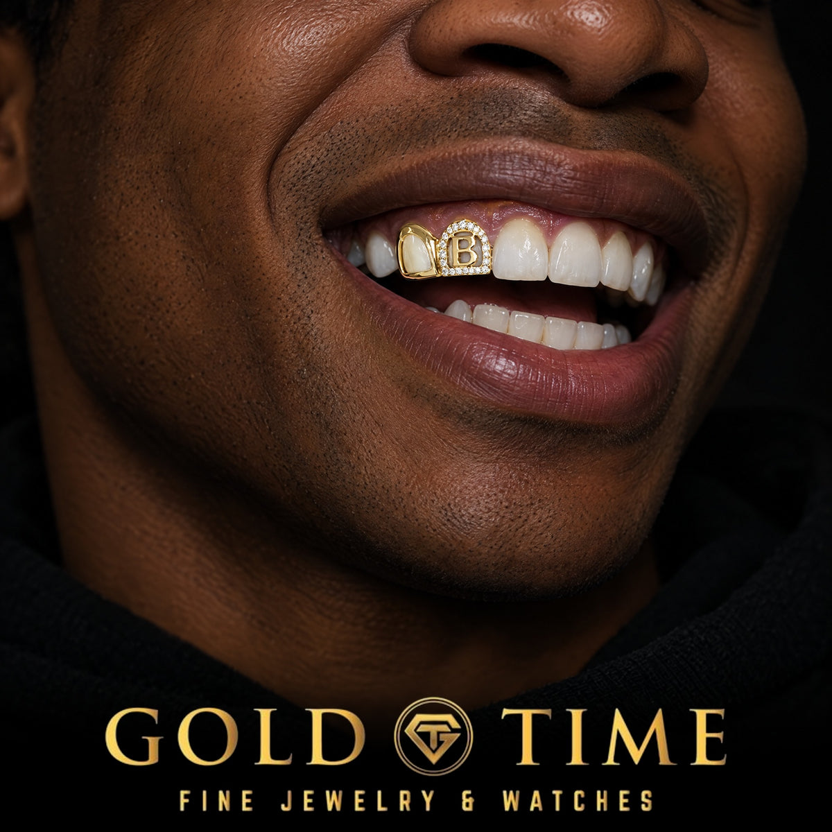 Laughing man wearing an open face double cap grill with a cut-out letter framed in moissanite, Gold Time