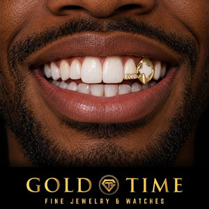 Man smiling in a yellow gold double cap grill with a Texas cutout canine fang and a moissanite tip on the incisor, Gold Time