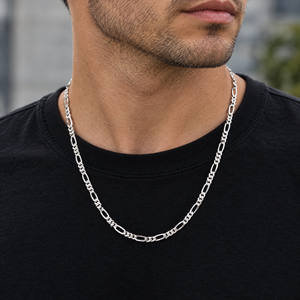 Sterling silver Figaro chain, 3.5mm, worn over a black t-shirt by a man, lifestyle photo, Gold Time