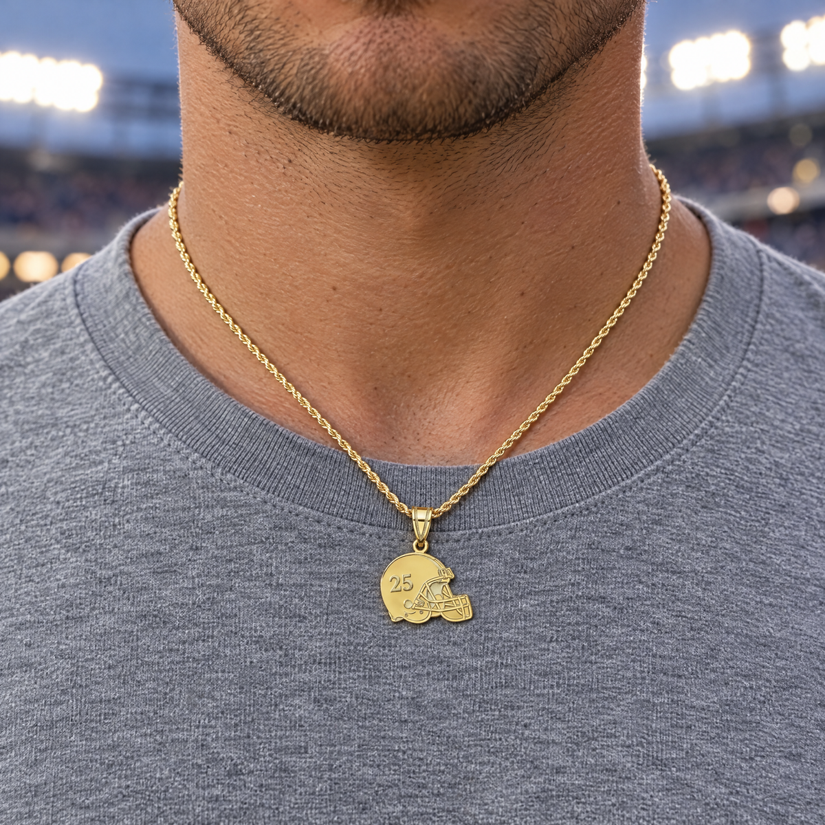 Yellow gold football helmet pendant with number 25, worn on a rope chain by a man, lifestyle photo, Gold Time