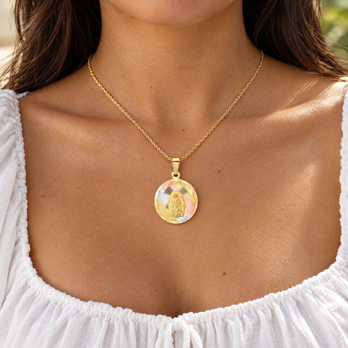 14K tri-color gold Lady of Guadalupe medal worn on a rope chain by a woman, lifestyle photo, Gold Time