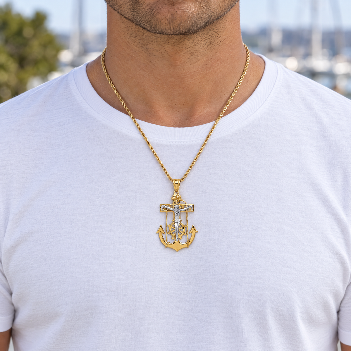 Two-tone gold mariner crucifix pendant worn on a yellow gold rope chain over a white t-shirt, lifestyle photo, Gold Time