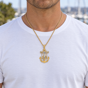 Two-tone gold mariner crucifix pendant worn on a yellow gold rope chain over a white t-shirt, lifestyle photo, Gold Time