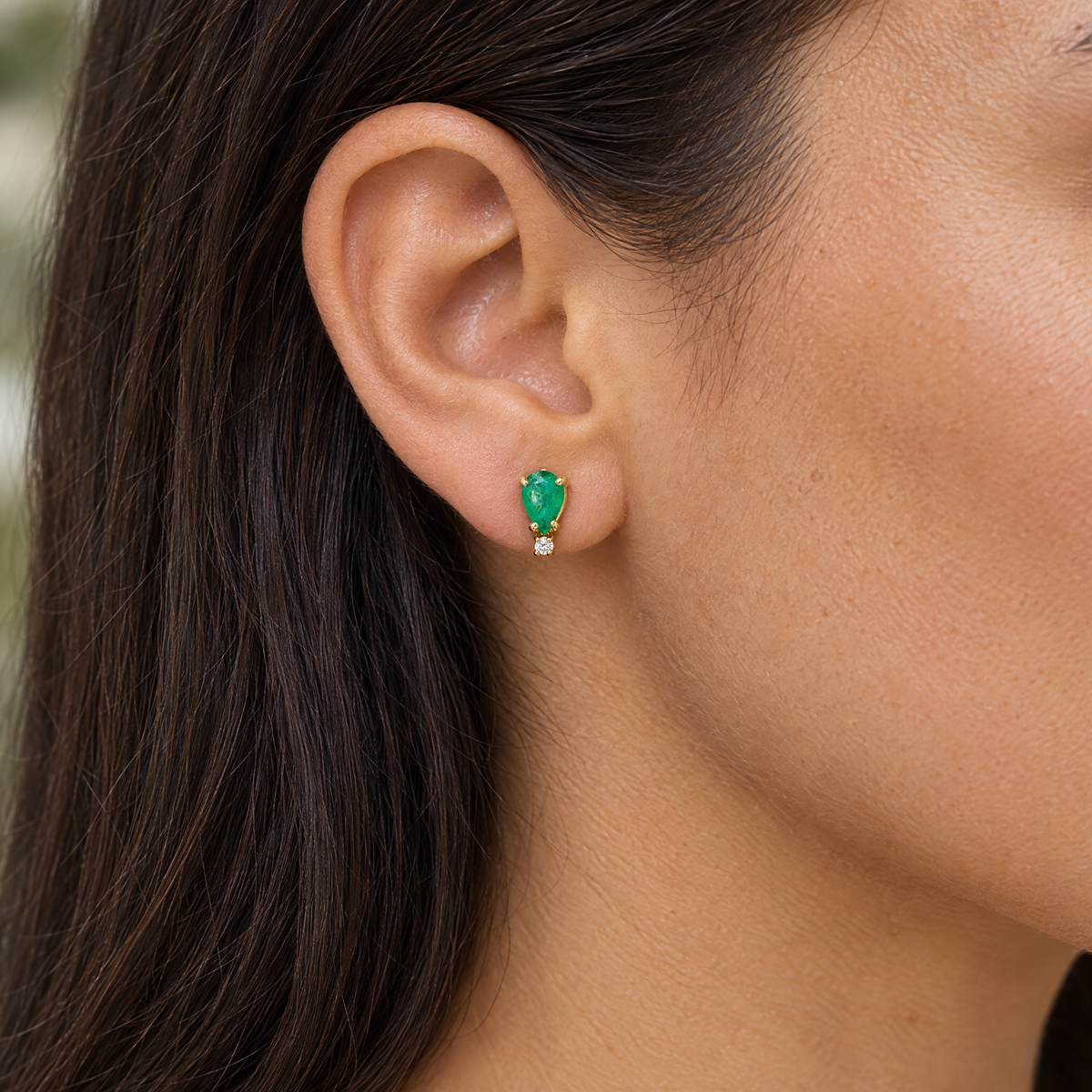 14K yellow gold pear cut emerald stud earring with diamond accent, worn on a woman's earlobe, lifestyle photo, Gold Time