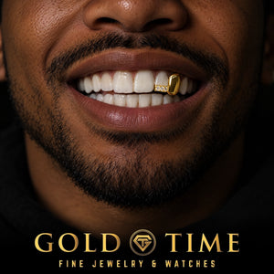 Man smiling in a solid gold canine cap next to a moissanite iced incisor tip, Gold Time