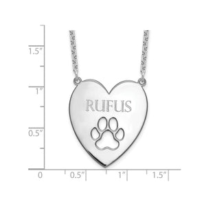 Sterling silver heart dog name necklace shown next to a ruler for size reference