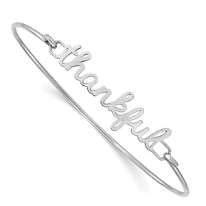 Sterling silver bangle with the word thankful in script