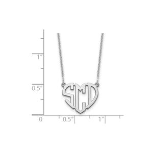 Three heart monogram necklaces in rose gold, yellow gold and silver shown side by side