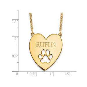 Gold plated heart dog name necklace shown next to a ruler for size reference