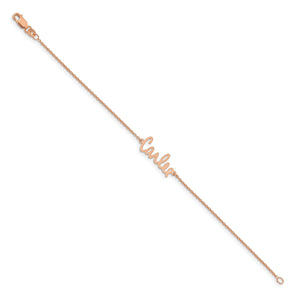 Full length of the rose signature name bracelet laid straight