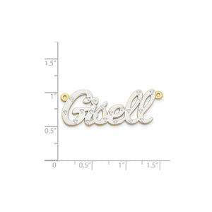 Gisell two-tone diamond name pendant beside a ruler showing its size