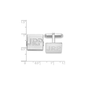 Silver square monogram cuff links on a ruler, about 0.6 inch across
