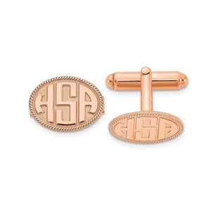 Rose oval cuff links with a raised three-letter monogram and rope border
