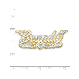 3D Brandy name plate next to a ruler, about 2 inches wide