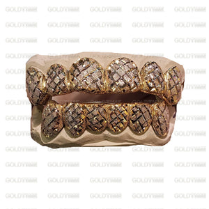 Two-tone trillion cut diamond dust grillz set on a watermarked background