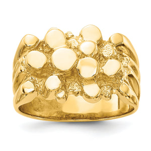 Close view of the raised nugget top on a solid gold men's ring