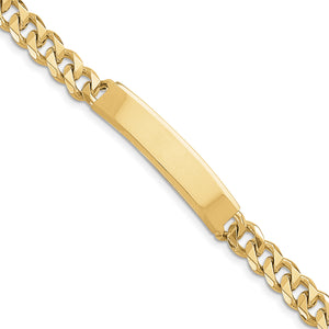 Close-up of the polished ID plate on a 14K gold curb link bracelet