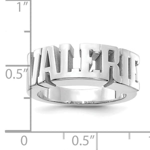 Silver custom name ring shown next to a ruler for size reference