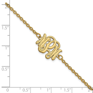Yellow gold monogram bracelet beside a ruler showing the size of the monogram