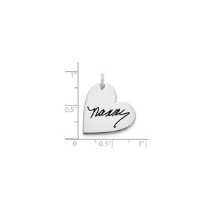 Silver signature heart pendant measured against a ruler at about three quarters of an inch