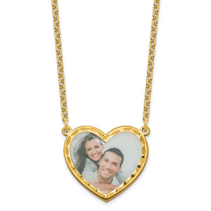 Gold plated heart photo pendant with a diamond cut frame holding a photo of two people, on a fine chain