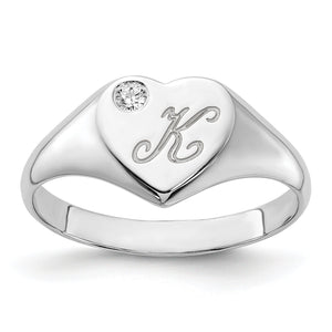 White gold heart signet ring with a script K initial and diamond accent, three quarter view