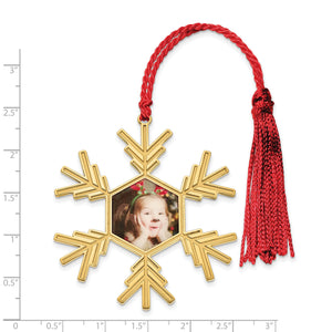 Size chart showing the snowflake ornament beside a ruler, about two inches across