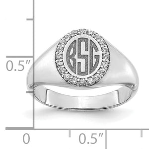 White gold monogram signet ring beside a ruler showing the face measurement