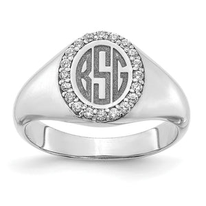 White gold oval signet ring with a three letter block monogram inside a diamond halo