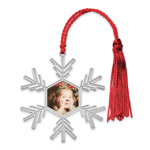 Sterling silver snowflake photo ornament with a red cord and tassel