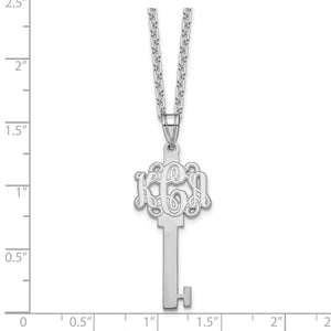 Monogram key necklace beside a ruler showing the pendant measures about 33 mm tall